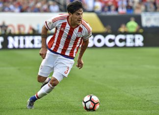 Paraguay's Gustavo Raul Gomez drives the ball during the Copa America Centenario football tournament match against the United States in Philadelphia, Pennsylvania, United States, on June 11, 2016. / AFP / NICHOLAS KAMM (Photo credit should read NICHOLAS KAMM/AFP/Getty Images)