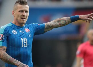 Slovakia's midfielder Juraj Kucka reacts during the Euro 2016 round of 16 football match between Germany and Slovakia at the Pierre-Mauroy stadium in Villeneuve-d'Ascq near Lille on June 26, 2016. / AFP / KENZO TRIBOUILLARD (Photo credit should read KENZO TRIBOUILLARD/AFP/Getty Images)