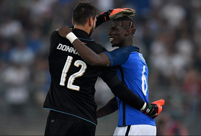 Gianluigi Donnarumma (L) and Paul Pogba of France chat at the end of the international friendly match between Italy and France at Stadio San Nicola on September 1, 2016 in Bari, Italy. (Photo by Claudio Villa/Getty Images)