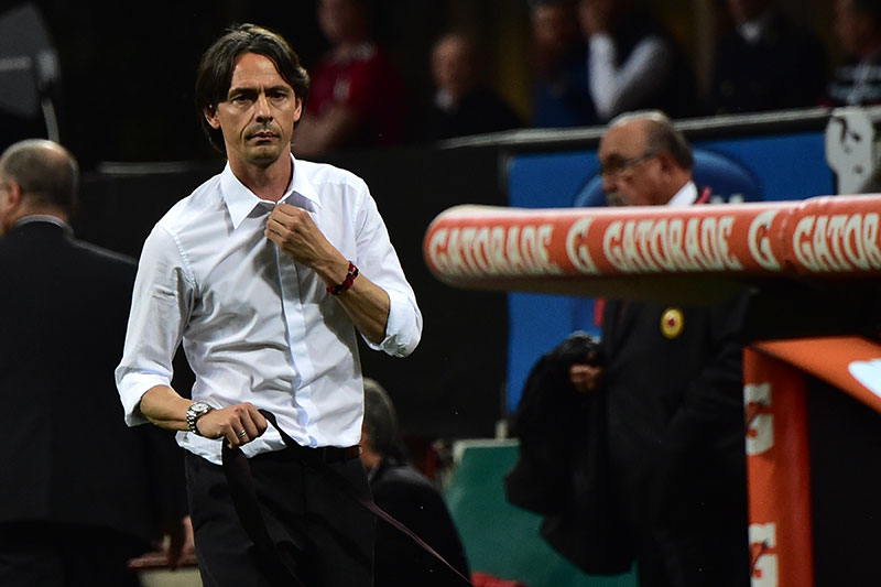 Filippo Inzaghi leaves the pitch after being sent off by the referee during the Serie A football match between AC Milan and AS Roma at San Siro Stadium in Milan on May 9, 2015. AFP PHOTO / GIUSEPPE CACACE (Photo credit should read GIUSEPPE CACACE/AFP/Getty Images)