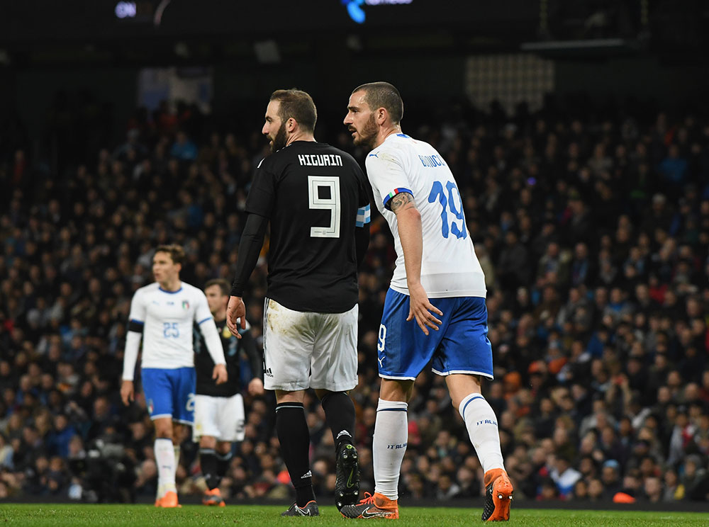 Gonzalo Higuain and Leonardo Bonucci during Italy-Argentina at Etihad Stadium on March 23, 2018. (Photo by Claudio Villa/Getty Images)